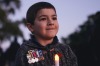 Luke Piontek, 6, wearing the medals of his uncle, Luke Worsley, who died in Afghanistan in 2007, at the Anzac Day Dawn ...