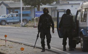 Indian military commandos stand at the Indian air force base in Pathankot, India, Tuesday, Jan.5, 2016.