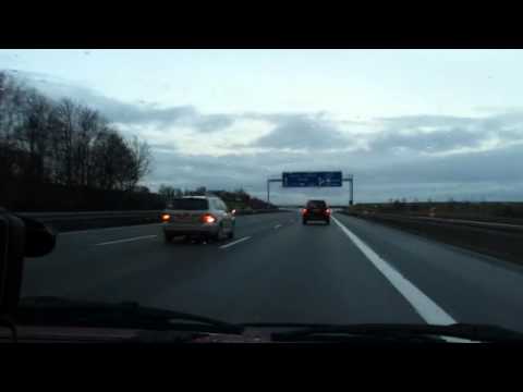 German-American Expat Couple Drives North on the A7 Autobahn in Germany