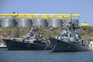 Russian Black Sea fleet ships are anchored in one of the bays of Sevastopol, Crimea, Monday, March 31, 2014.