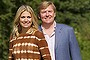 Prince Willem-Alexander (R) of the Netherlands and his wife Princess Maxima are seen during the annual summer photocall in Wassenaar on this July 7, 2012 file photo. Queen Beatrix, who turns 75 on Thursday, announced she was abdicating in favour of her son, Prince Willem-Alexander, who will become king on April 30, 2013.       REUTERS/Michael Kooren/Files    (NETHERLANDS - Tags: ROYALS POLITICS)