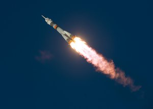 The Soyuz TMA-19M rocket is launched with Expedition 46 Soyuz Commander Yuri Malenchenko of the Russian Federal Space Agency (Roscosmos), Flight Engineer Tim Kopra of NASA, and Flight Engineer Tim Peake of ESA (European Space Agency), Tuesday, Dec. 15, 2015 at the Baikonur Cosmodrome in Kazakhstan.  Malenchenko, Kopra, and Peake will spend the next six-months living and working aboard the International Space Station.  Photo Credit: (NASA/Joel Kowsky)