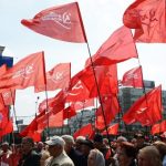 Communist Party of Ukraine (KPU) flags at a May Day 2014 rally in Ukraine. This party has faced vicious state repression and violent fascist attacks since the February 2014 right wing coup. The international workers movement must stand in solidarity with the KPU against right wing attacks.