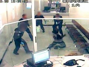 Perth, 2008: CCTV footage shows police repeatedly tasering Aboriginal man Kevin Spratt for refusing a strip search while incarcerated at the East Perth watch house. Spratt was humiliated, shackled and subjected to gruesome tasering. In just one week, police and prison guards tasered Spratt 41 times. Police and prison guards are responsible for the most hideous racist attacks on Aboriginal people. Over the last three decades, hundreds of Aboriginal people have been killed in custody at the hands of state forces.