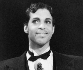 Singing star Prince is all smiles as he addresses the audience at the American Music Awards, Jan. 27, 1986 in Los Angeles.