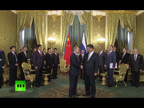 RAW: Chinese president arrives in Russia, meets with Putin