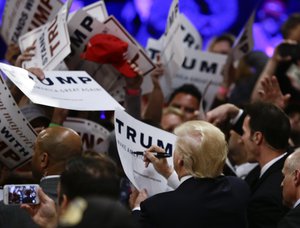 Republican presidential candidate Donald Trump greets supporters after a rally, Thursday, April 28, 2016 in Costa Mesa, Calif.