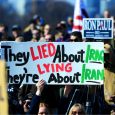 Photo of protest signs reading they lied about Iraq, they're lying about Iran