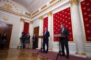 With U.S. Assistant Secretary and Spokesperson John Kirby and his Russian counterpart looking on, U.S. Secretary of State John Kerry and Russian Foreign Minister Sergey Lavrov address reporters at a joint news conference at the Kremlin in Moscow, Russia, on March 24, 2016