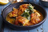 Simple fish curry. Caroline Velik INDIAN recipes for Epicure and Good Living. Photographed by Marina Oliphant. Food preparation and styling by Caroline Velik. Wooden masala box, table and background from Out of India, small vessels and bottles from The Works, MUST CREDIT. The Age Newspaper and The Sydney Morning Herald. Photographed September 16, 2011.