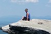 The hike is steep but the view is breathtaking, Siobhan sitting atop of MacAfee Knob, Virginia.