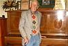 Stan Brown stands proud with the bat he played against England with which is signed by the man he got out English captain George "Gubby" Allen