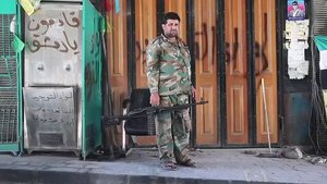 Free Syrian Army soldier with machine gun in Aleppo