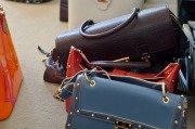 According to the ATO, handbags are not tax deductible as a general rule, while briefcases are.