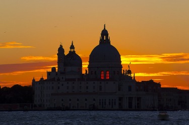 Venice, Italy. Beautiful view of the setting sun whilst travelling in Venice by public transport.