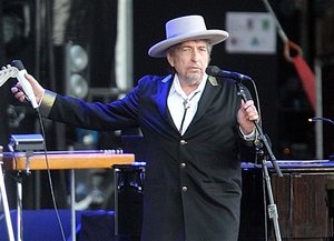 FILE - This July 22, 2012 file photo shows U.S. singer-songwriter Bob Dylan performing on stage at "Les Vieilles Charrues" Festival in Carhaix, western France. French authorities have filed preliminary charges against Bob Dylan over an interview in which he is quoted comparing Croatians to Nazis and the Ku Klux Klan. Paris prosecutor’s office spokeswoman Agnes Thibault-Lecuivre said Monday the charges of “public insult and inciting hate” were filed in mid-November.The charges stemmed from a lawsuit by a Croatian advocacy group in France over an interview in Rolling Stone magazine in 2012.