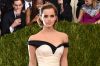 Emma Watson pulled a Hermione Granger with the wizardry behind her black and white gown for the Met Gala on Monday night ...