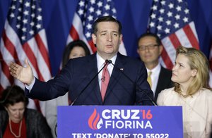 Republican presidential candidate, Sen. Ted Cruz, R-Texas, speaks as his wife, Heidi, listens during a primary night campaign event, Tuesday, May 3, 2016, in Indianapolis.