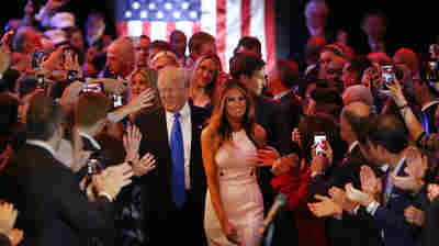 Donald Trump and his wife, Melania, arrive to speak to supporters at Trump Tower in New York following his victory in Indiana Tuesday. Improbably, Trump is now assured of being the GOP nominee.