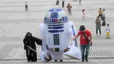 A Star Wars fan, dressed as R2D2, arrives during the annual Star Wars Day in Taipei, Taiwan, on May 4.