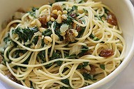 Spaghetti with silverbeet, raisins and pine nuts.