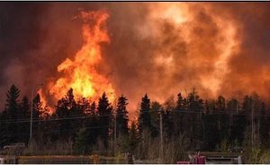 Emergency Declared As Fire Burns Canada Oil Town