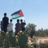 Demonstrators with the Palestinian flag in Ni'lin