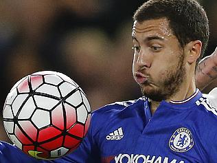 Chelsea's Eden Hazard, left, vies for the ball with Tottenham's Kyle Walker during the English Premier League soccer match between Chelsea and Tottenham Hotspur at Stamford Bridge stadium in London, Monday, May 2, 2016. (AP Photo/Frank Augstein)