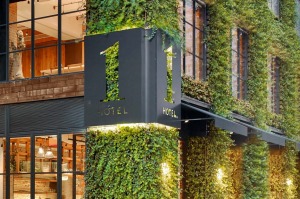 The hotel's three-storey facade is covered in ivy.