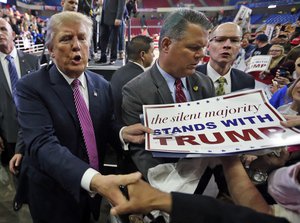 Republican presidential candidate Donald Trump shakes the hand of a supporter during a rally in Charleston, W.Va., Thursday, May 5, 2016.