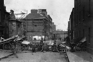 File - A street barricade erected by the rebels to end British rule during the Easter Rebellion in Dublin, Ireland, April, 1916.