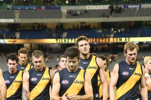 Flagging fortunes: The Tigers leave the field after their loss to Port Adelaide on Saturday.