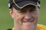 Tigers coach Damien Hardwick watches Alex Rance at training.