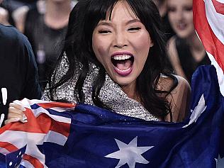 Australia's Dami Im, center, celebrates when learning that she advanced to the final during the second Eurovision Song Contest semifinal in Stockholm, Sweden, Thursday, May 12, 2016. (AP Photo/Martin Meissner)