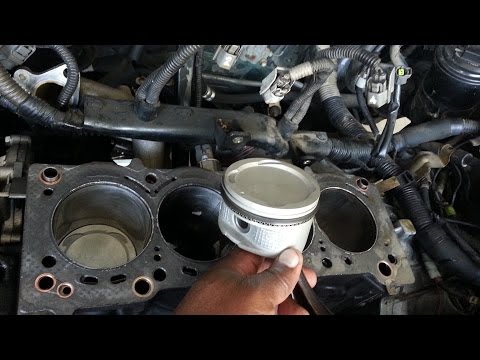 Toyota Corolla Engine rebuild, Install pistions, Install cylinder head, set engine timing