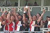 Benalla captain James Martiniello and coach Luke Morgan raise the cup