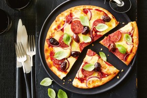 Olive, pepperoni and basil pizza