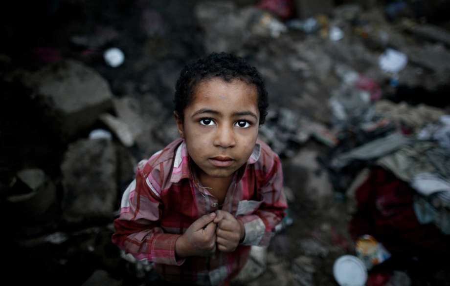 In this April 25, 2016 photo, a boy from the community who call themselves the "Muhammasheen," or "the Marginalized," stands near his hut in a slum area of Sanaa, Yemen. They are Yemen's untouchables, a dark-skinned ethnic group that for centuries has been consigned to the bottom of Yemen's social scale, faced with discrimination and racism, and shunned by others. Vulnerable with no tribal protection, they have been hit particularly hard in Yemen's civil war. Photo: Hani Mohammed, AP / Copyright 2016 The Associated Press. All rights reserved. This material may not be published, broadcast, rewritten or redistribu