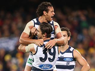 Steven Motlop of the Cats is congratulated by team mate Shane Kersten after kicking a goal during the Round eight AFL match between the Adelaide Crows and the Geelong Cats at the Adelaide Oval in Adelaide, Friday, May 13, 2016 (AAP Image/Ben Macmahon) NO ARCHIVING, EDITORIAL USE ONLY