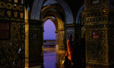 This photo was taken in Myanmar in January 2016 in a buddhist temple on top of Mandalay Hill. The photo was taken just ...