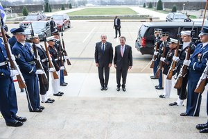 File - Defense Secretary Ash Carter, center right, hosts an honor cordon welcoming Israeli Defense Minister Moshe Yaalon, center left, to the Pentagon, March 14, 2016.