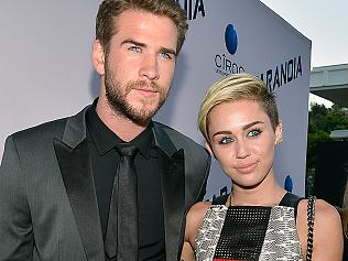 LOS ANGELES, CA - AUGUST 08: Actor Liam Hemsworth and singer Miley Cyrus attend the premiere of Relativity Media's "Paranoia" at DGA Theater on August 8, 2013 in Los Angeles, California. (Photo by Frazer Harrison/Getty Images for Relativity Media)