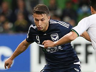 Kosta Barbarouses in action for Victory against Choi Jaesoo for Jeonbuk during the round 16 AFC Champions League game between Melbourne Victory and Jeonbuk Hyundai Motors from Korea at AAMI stadium in Melbourne, Tuesday, May17. 2016. (AAP Image/David Crosling) NO ARCHIVING, EDITORIAL USE ONLY