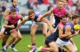 MELBOURNE, AUSTRALIA - MAY 15:  Jeff Garlett of the Demons tackles Matthew Boyd of the Bulldogs during the round eight ...