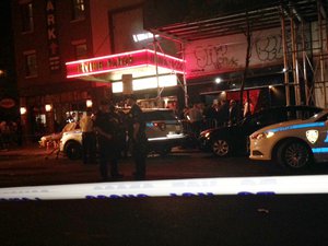 Authorities stand outside Irving Plaza, near Manhattan's Union Square in New York after a shooting Wednesday, May 25, 2016.