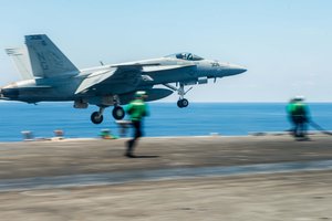 An F/A-18E Super Hornet assigned to the Warhawks of Strike Fighter Squadron (VFA) 97 launches from USS John C. Stennis' flight deck during routine flight operations in the South China Sea, 19 May, 2016.