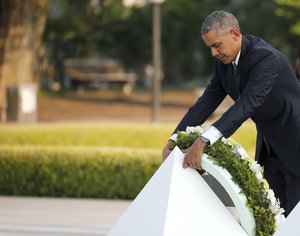 U.S. President Barack Obama lays a wreath at Hiroshima Peace Memorial Park in Hiroshima, western, Japan, Friday, May 27, 2016. Obama on Friday became the first sitting U.S. president to visit the site of the world's first atomic bomb attack, bringing global attention both to survivors and to his unfulfilled vision of a world without nuclear weapons.