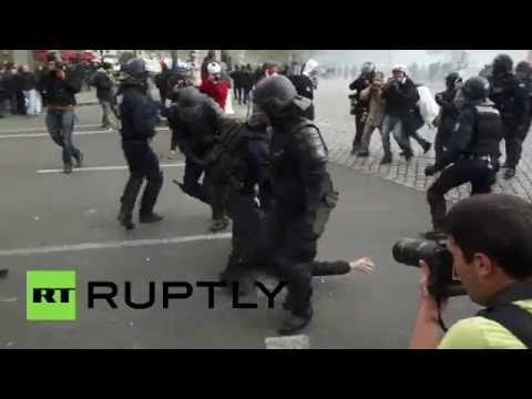 Tear gas in Paris as hundreds protest labor reforms