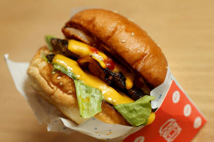 MELBOURNE, AUSTRALIA - DECEMBER 11:  The Double Dragon burger served at 8Bit burger restaurant in the cbd on December 11, 2015 in Melbourne, Australia.  (Photo by Pat Scala/Fairfax Media)