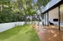 2/5-7 Manning Street, Rozelle. The turf is artificial and the garden beds are under the timed care of a watering system.